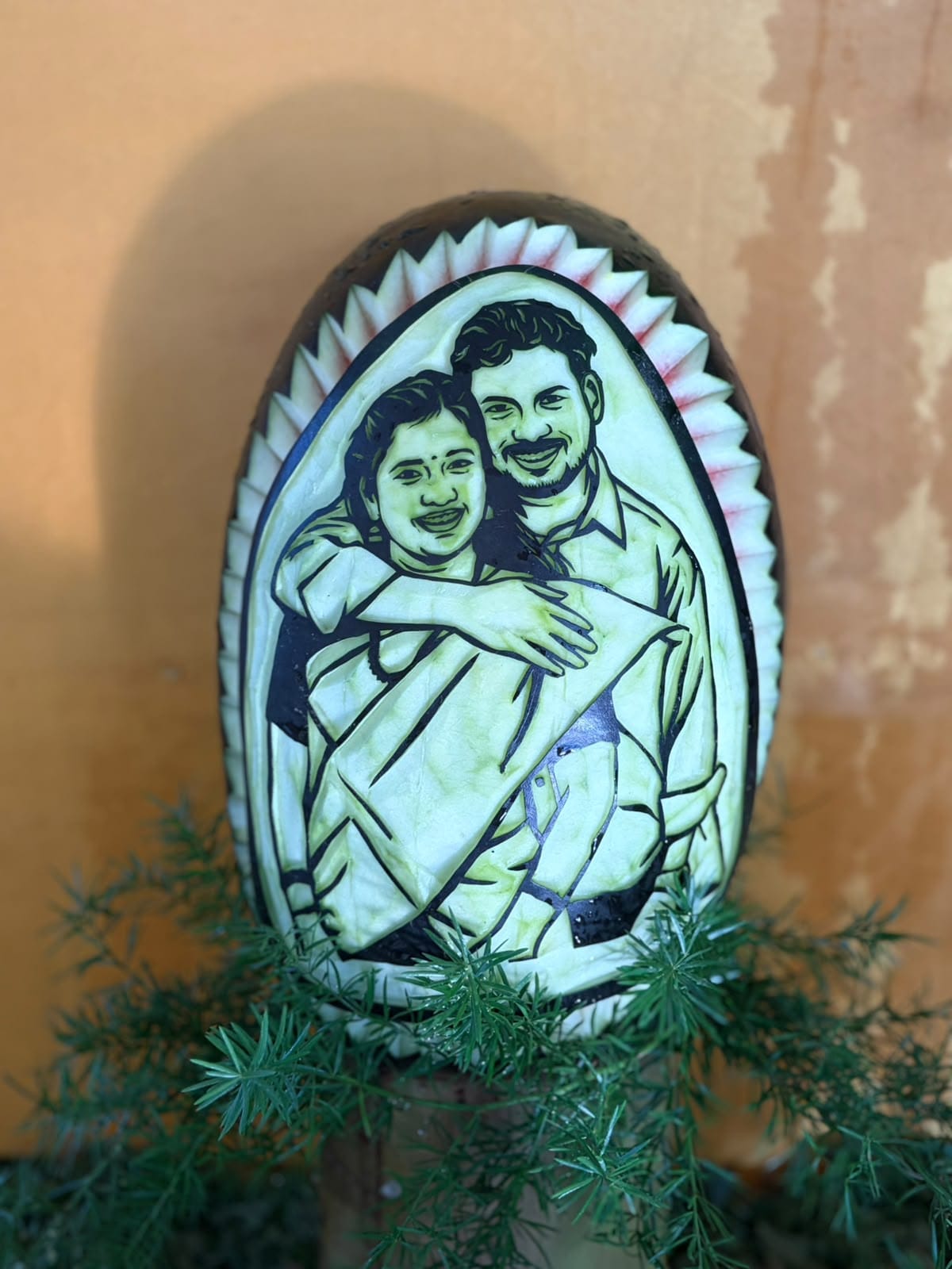 Personalised couple portrait display surrounded by greenery