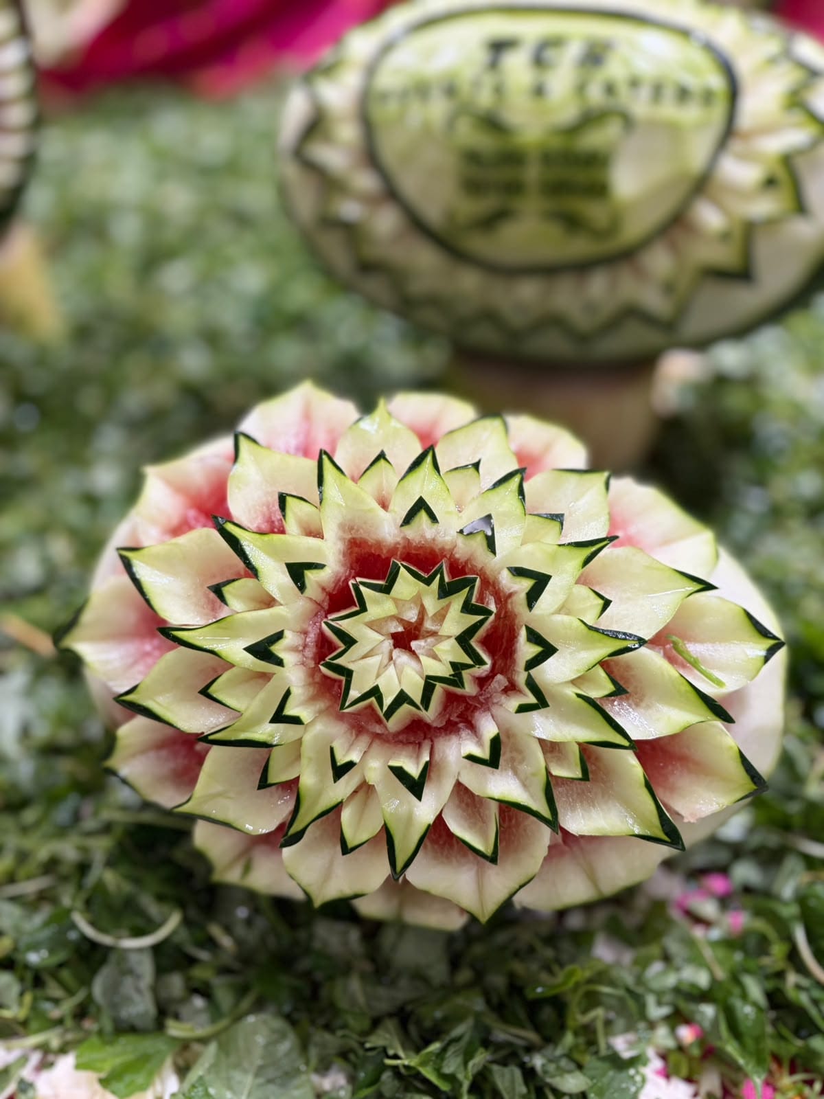 Colourful wedding installation with floral arrangements